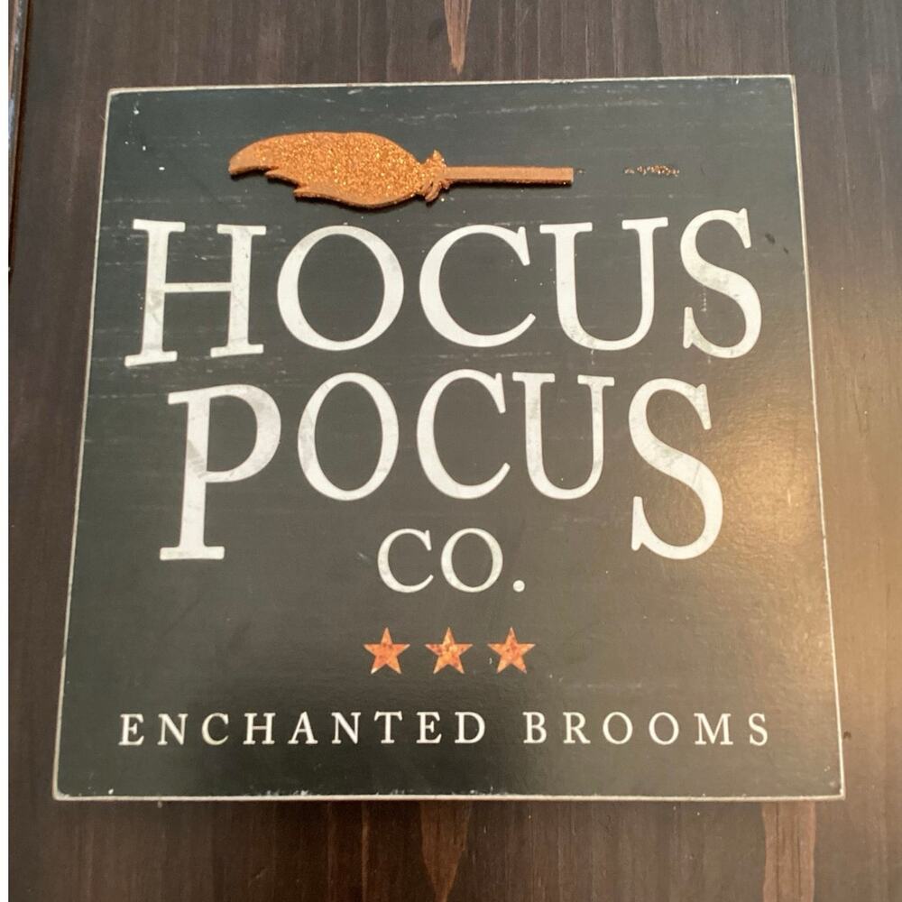NWOT Halloween-themed decorative wall sign "Hocus Pocus Co. Enchanted Brooms"